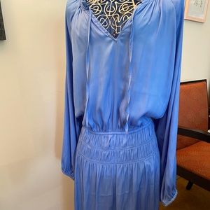 Periwinkle blue, poet neckline.